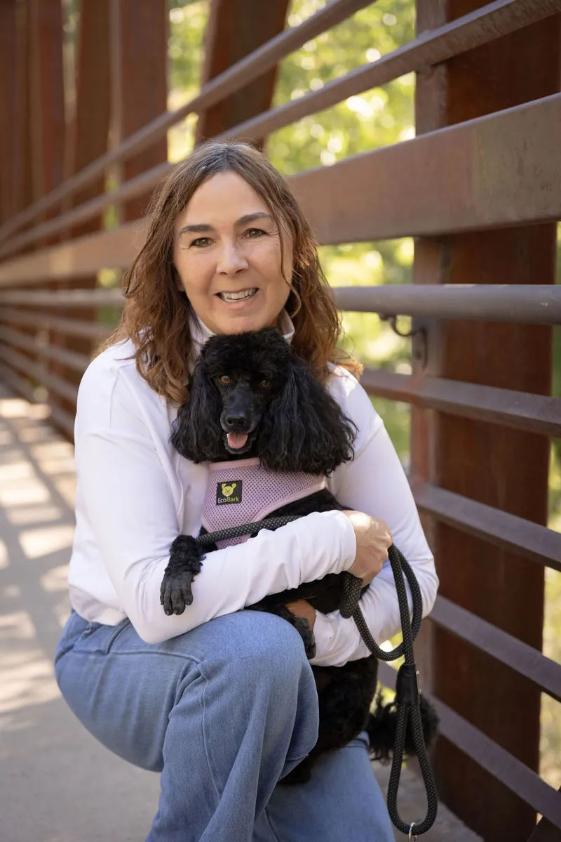 Melissa Hunt with her miniature poodle, Bree